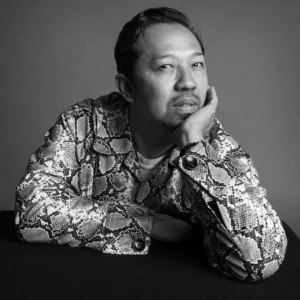 Humberto Leon, creative director of St. John, featured in ATELIER Magazine's coverage of American heritage luxury.