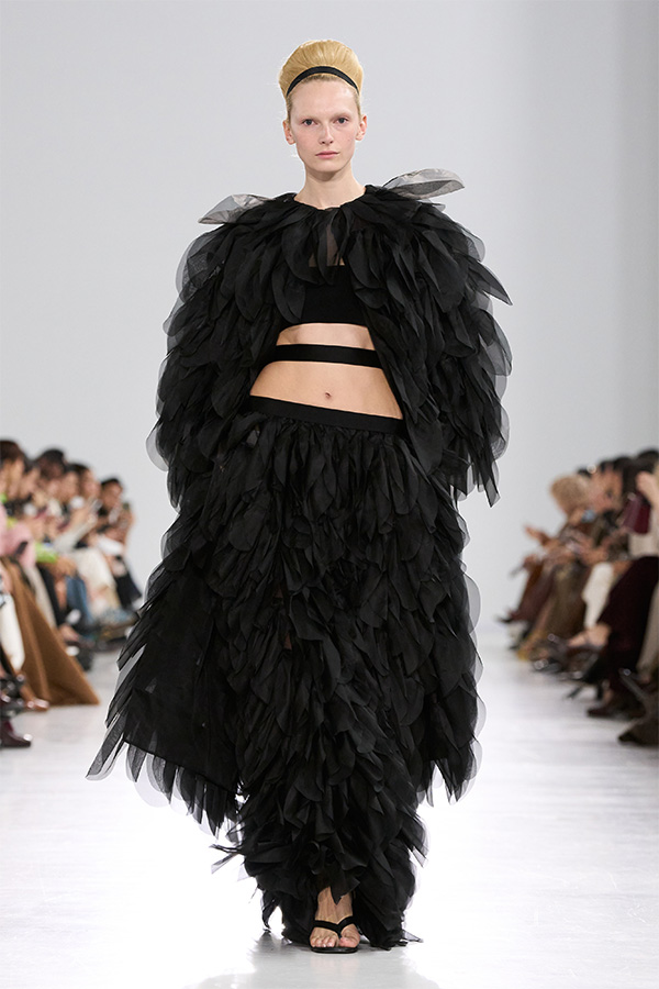 Max Mara Spring/Summer 2027 runway look featuring a sculptural black feathered ensemble.